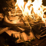 SantaCon Boss BUSTED—Mansions Built With Charity Cash… Burning stack of money in flames