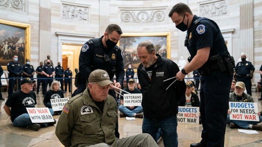 shutterstock_2770164395.jpg Veterans being arrested during a protest in the Capitol building