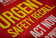 MASSIVE Costco RECALL Sparks Fire FEAR Urgent Safety Recall sign on red background.