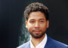 Staged Love? Smollett Sparks Fresh Uproar Jussie Smollett posing at a red carpet event