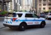 Chicago Police SUV parked on a city street.