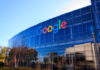 Google headquarters building with colorful logo.